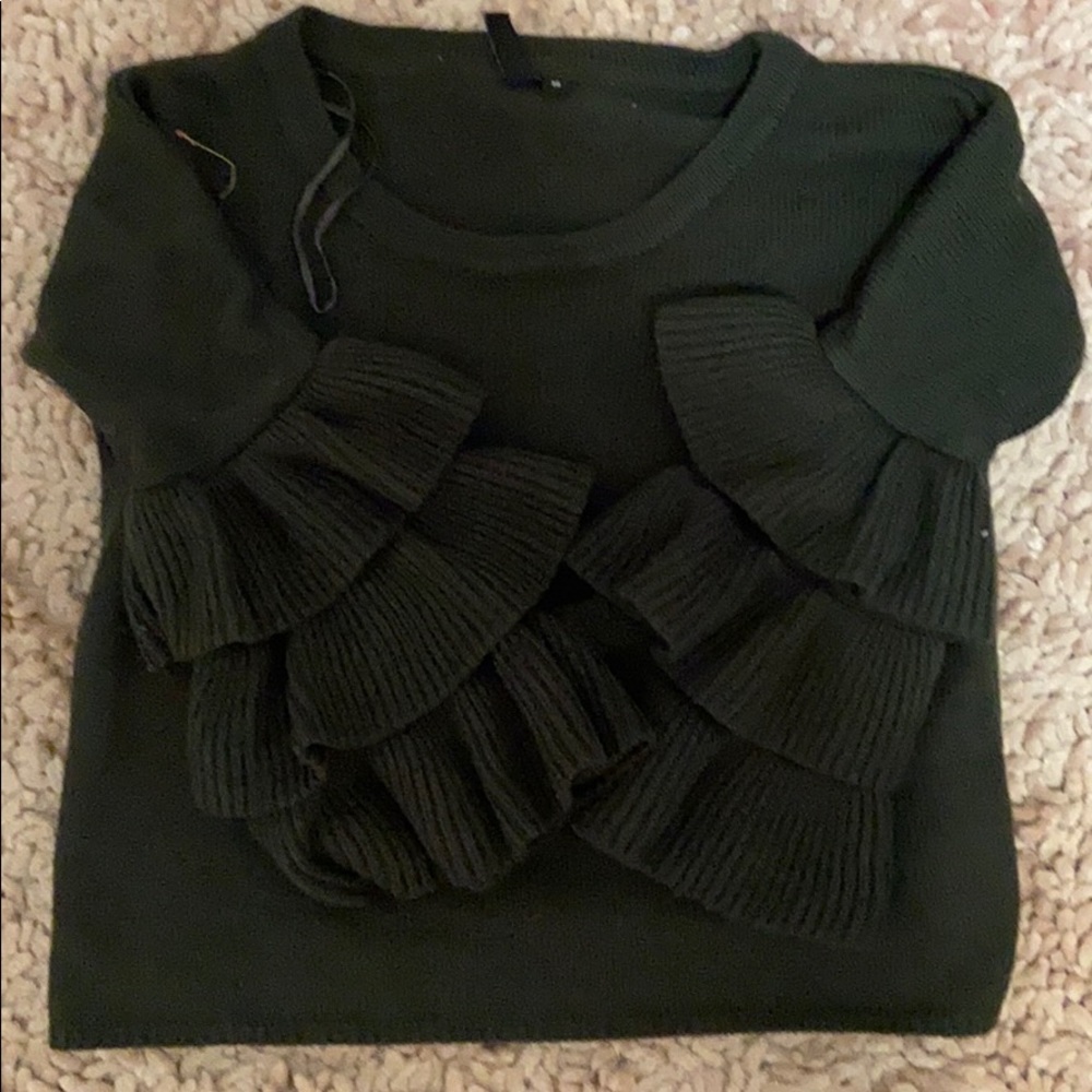 Green long sleeve shirt with ruffles on sleeves